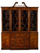 A mahogany and inlaid library bookcase in George III style