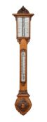 A Victorian carved oak mercury stick barometer