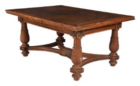 A walnut draw leaf dining table