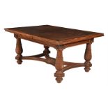 A walnut draw leaf dining table