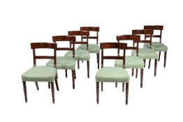 Y A set of eight mahogany and ebony line inlaid dining chairs in Regency style