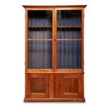 AN OAK GUN CABINET, EARLY 20TH CENTURY