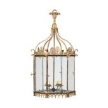 A REGENCY STYLE PATINATED AND GILT BRASS HEXAGONAL LANTERN