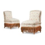 A PAIR OF VICTORIAN LOW UPHOLSTERED SIDE CHAIRS