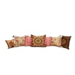 SEVEN EMBROIDED AND NEEDLEWORK CUSHIONS