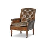 A WILLIAM IV MAHOGANY FRAMED AND BUTTON LEATHER UPHOLSTERED LIBRARY CHAIR
