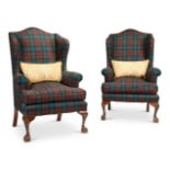 A PAIR OF GEORGE III STYLE UPHOLSTERED WING ARMCHAIRS