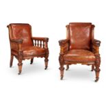 A PAIR OF VICTORIAN CARVED OAK LIBRARY ARMCHAIRS