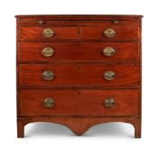 A GEORGE III MAHOGANY AND INLAID CHEST OF DRAWERS