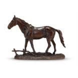 A PATINATED BRONZE MODEL OF A HORSE, PROBABLY FRENCH, LATE 19TH CENTURY