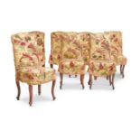 A SET OF FOURTEEN LOUIS XV STYLE WALNUT AND UPHOLSTERED SIDE CHAIRS