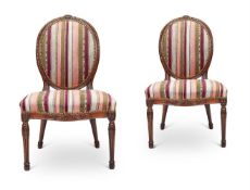 A PAIR OF GEORGE III MAHOGANY SALON CHAIRS, CIRCA 1775