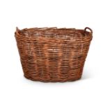 A LARGE WICKER LOG BASKET