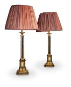 A PAIR OF PATINATED AND PARCEL-GILT 'ABBOTSFORD' OIL LAMP BASES