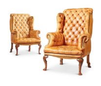 A PAIR OF GEORGE II STYLE WALNUT FRAMED ARMCHAIRS