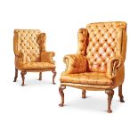 A PAIR OF GEORGE II STYLE WALNUT FRAMED ARMCHAIRS