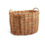 A LARGE WICKER LOG BASKET, ROBERT KIME