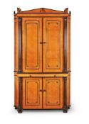 Y A REGENCY STYLE AMBOYNA AND EBONISED CABINETBY ROBERT KIME