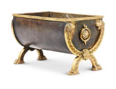 A FRENCH PATINATED AND BRASS LOG BIN, 20TH CENTURY