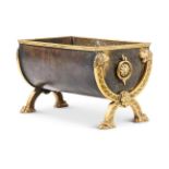 A FRENCH PATINATED AND BRASS LOG BIN, 20TH CENTURY