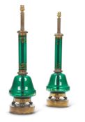 A PAIR OF GREEN GLASS GILT AND METAL MOUNTED LAMP BASES