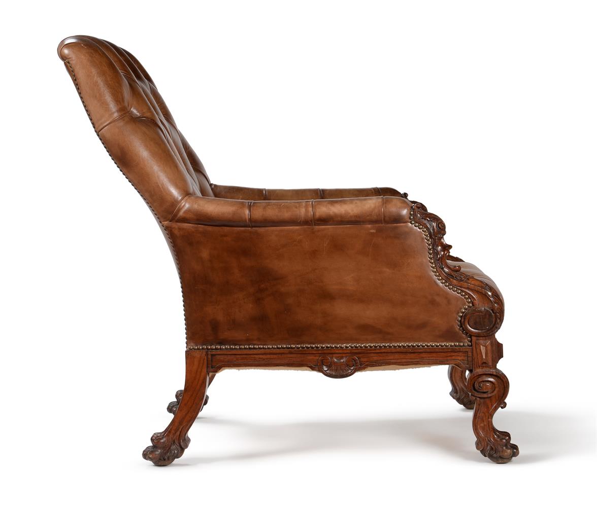 A VICTORIAN CARVED WALNUT AND BUTTONED LEATHER UPHOLSTERED LIBRARY ARMCHAR, SECOND HALF 19TH CENTURY - Image 2 of 6