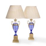 A PAIR OF GILT METAL MOUNTED CUT BLUE GLASS LAMPS, CONTEMPORARY, IN EMPIRE STYLE