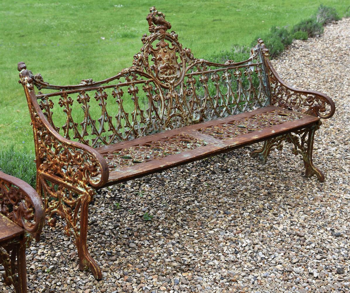A CAST IRON BENCH IN THE COALBROOKDALE 'GOTHIC' PATTERN, LATE 20TH CENTURY