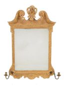 A GEORGE II GILTWOOD WALL MIRROR, CIRCA 1725, IN THE MANNER OF MOORE & GUMLEY