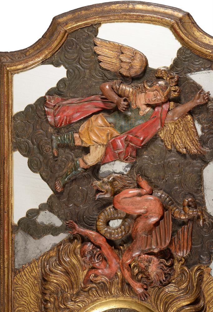 A PAIR OF SPANISH GILTWOOD FRAMED MIRRORS OVERLAID WITH CARVED RELIEFS OF ST LAWRENCE AND ST MICHAEL - Image 4 of 7