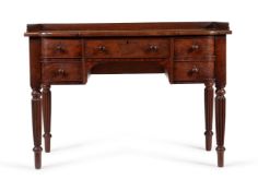 A GEORGE IV MAHOGANY AND EXOTIC HARDWOOD DRESSING TABLE, CIRCA 1825, IN THE MANNER OF GILLOWS