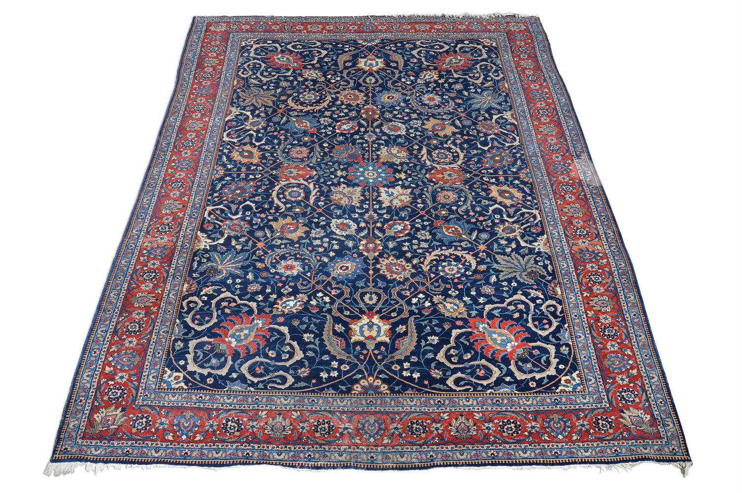 A TABRIZ CARPET, approximately 569 x 395cm