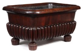 A GEORGE IV MAHOGANY WINE CISTERN, CIRCA 1825, IN THE MANNER OF GILLOWS