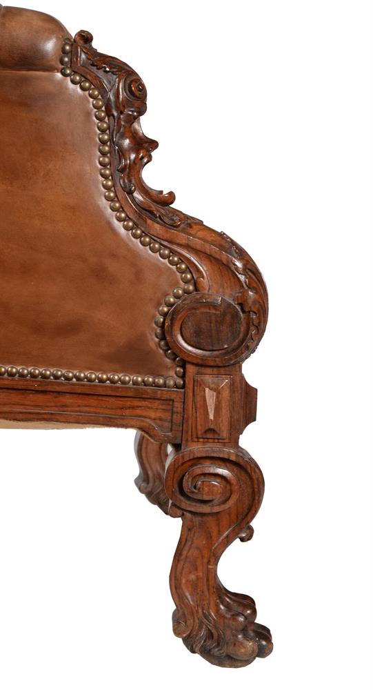 A VICTORIAN CARVED WALNUT AND BUTTONED LEATHER UPHOLSTERED LIBRARY ARMCHAR, SECOND HALF 19TH CENTURY - Image 4 of 6