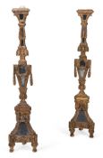 A PAIR OF CONTINENTAL GILTWOOD ALTAR STICKS, SECOND HALF 18TH CENTURY