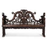 A CONTINENTAL CARVED PINE HALL BENCH, LATE 18TH/EARLY 19TH CENTURY