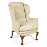 A GEORGE II WALNUT WING ARMCHAIR, CIRCA 1740