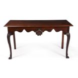 AN IRISH GEORGE II MAHOGANY HALL OR SERVING TABLE, CIRCA 1750