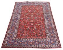 AN ISFAHAN CARPET, approximately 338 x 229cm