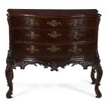 AN EARLY GEORGE III MAHOGANY SERPENTINE COMMODE, CIRCA 1760