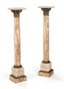 A PAIR OF FRENCH GILT METAL MOUNTED ONYX PEDESTAL COLUMNS, LATE 19TH/EARLY 20TH CENTURY