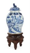 A LARGE CHINESE BLUE AND WHITE PORCELAIN VASE AND COVER ON FRENCH CARVED WALNUT STAND