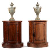 A PAIR OF GEORGE IV MAHOGANY CYLINDRICAL BEDSIDE OR PEDESTAL CUPBOARDS, CIRCA 1825