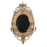 A VICTORIAN GILTWOOD AND COMPOSITION GIRANDOLE WALL MIRROR, MID 19TH CENTURY