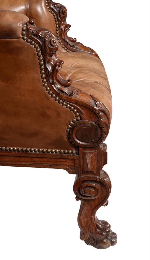 A VICTORIAN CARVED WALNUT AND BUTTONED LEATHER UPHOLSTERED LIBRARY ARMCHAR, SECOND HALF 19TH CENTURY - Image 5 of 6