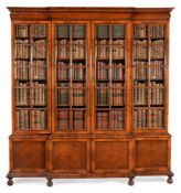A WALNUT AND SEAWEED MARQUETRY BREAKFRONT BOOKCASE, 20TH CENTURY, BY GILL & REIGATE