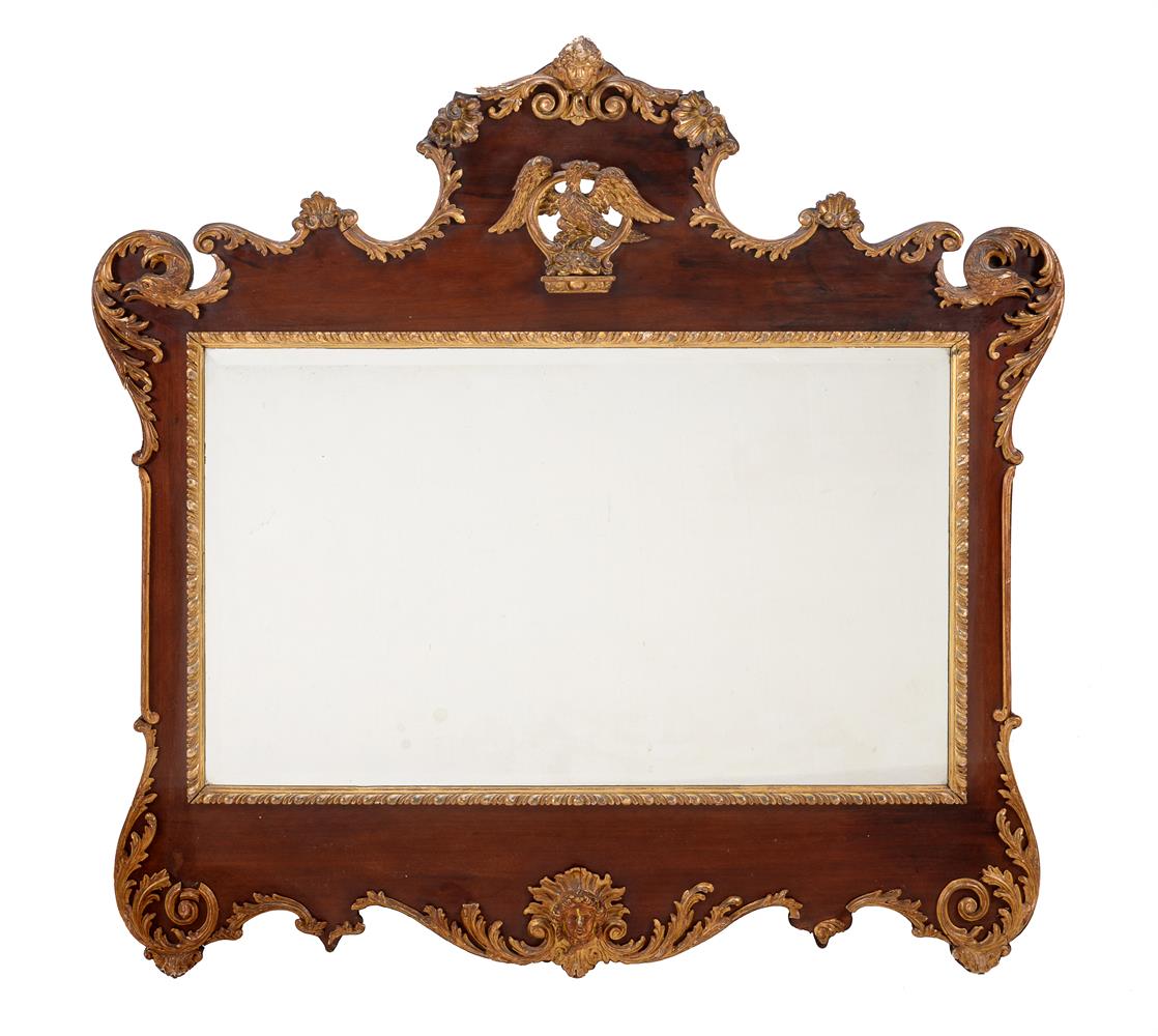 A 'RED WALNUT' AND CARVED GILTWOOD WALL MIRROR, 19TH CENTURY