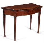 A GEORGE III FIGURED MAHOGANY SERPENTINE TEA TABLE, CIRCA 1790