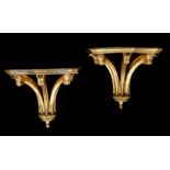 A PAIR OF CARVED GILTWOOD AND GESSO WALL BRACKETS, IN GEORGE III STYLE