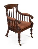 A WILLIAM IV OAK AND UPHOLSTERED LIBRARY ARMCHAIR, CIRCA 1835